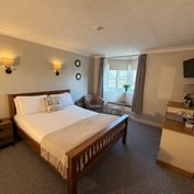 River-view double room with bay window, wall lights and dressing table